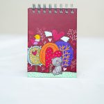 Libreta niña árbol corazón