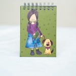 Libreta niña y perro